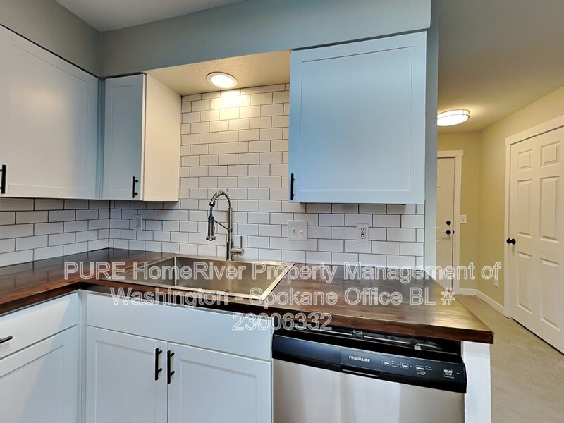 Large Front Porch | Stainless Appliances | Beautiful White Kitchen property image